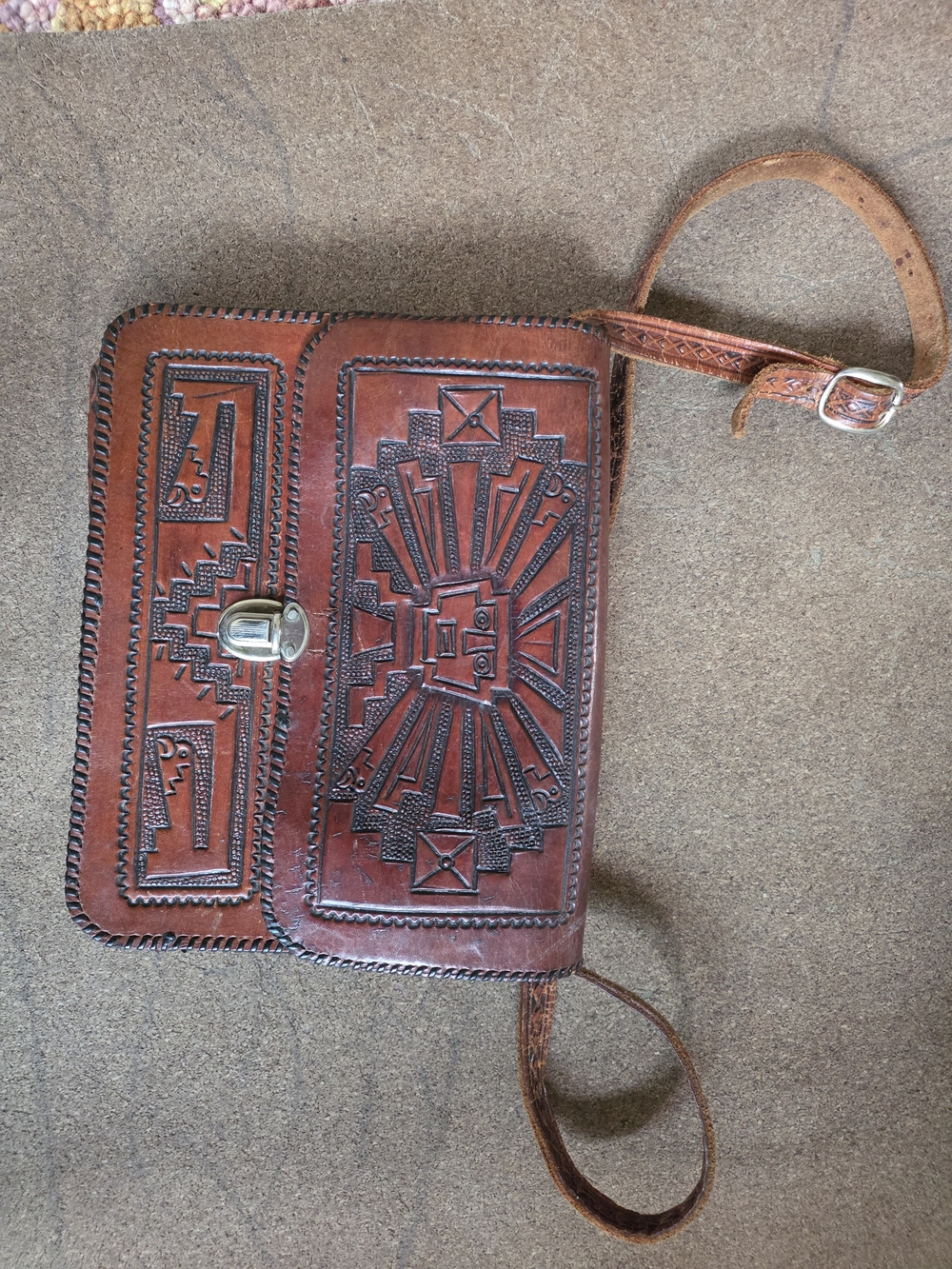 Handcrafted Brown Leather Crossbody Bag with Embossed Geometric Design